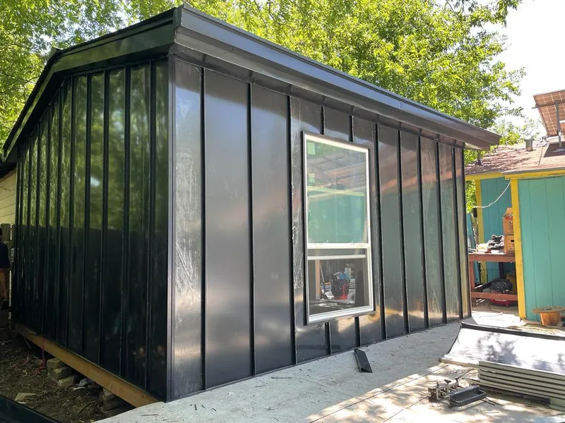 Black standing seam metal wall panels for Metal Roof Installation in Tiffin